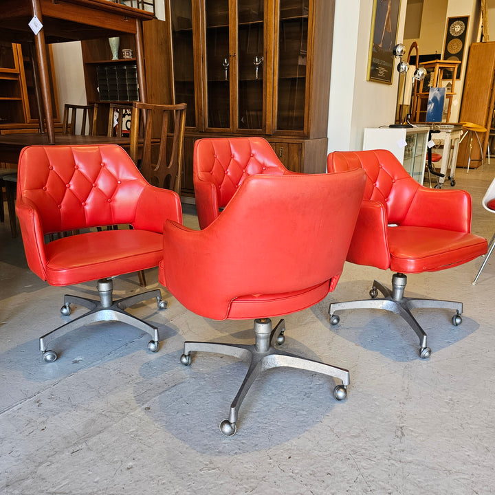 MCM Orange Tufted Vinyl Club Chair on Casters